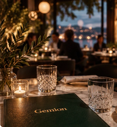 An illustrative candlelit restaurant table, set for a good evening, with a forest-green Gemion menu.